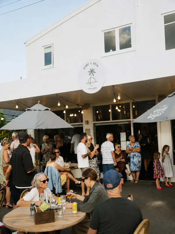 Guests gathered outside Benny and Brew