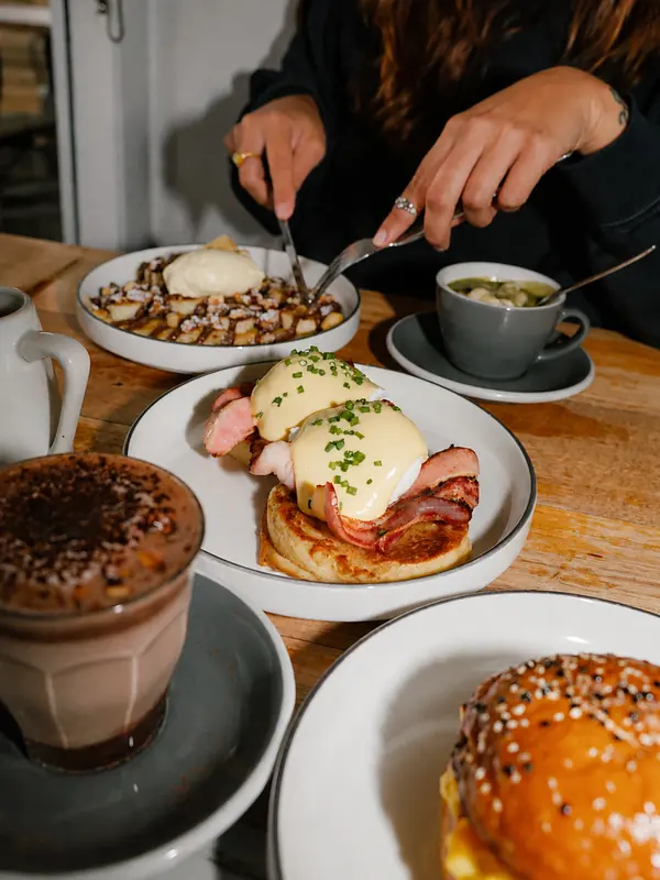 Eggs Benedict and coffee at Benny and Brew