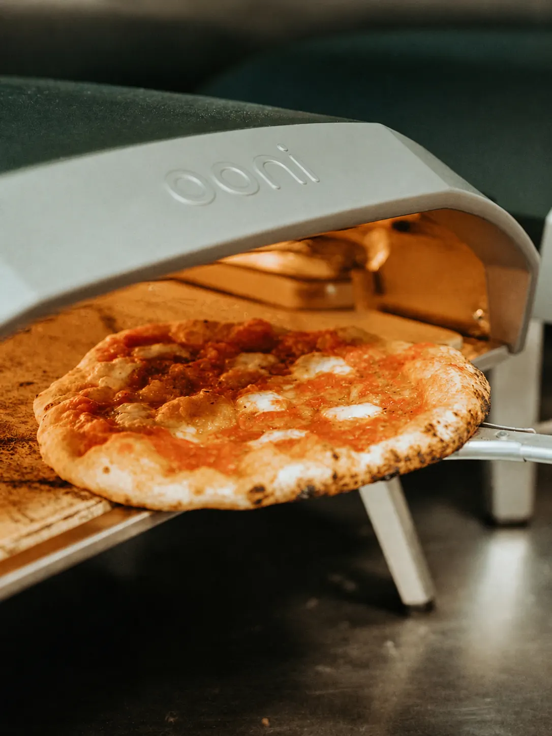 A flatbread coming out of the Benny and Brew oven